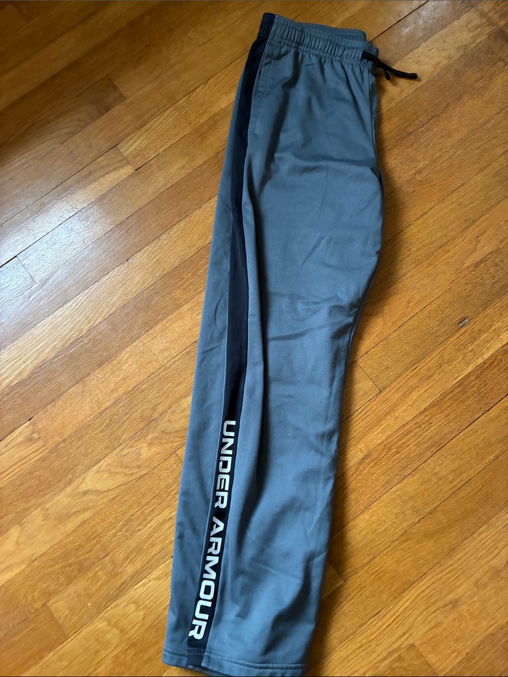 Under Armour kids XL  Gray Joggers with Black Side Stripe
